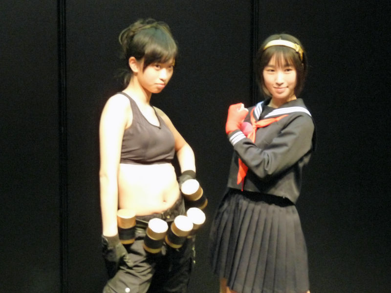 Illustration for article titled 2009's Cosplaying Arcade Game Booth Companions